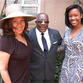 three people standing outdoors