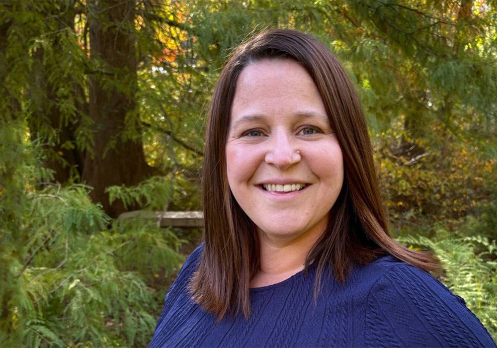 Portrait of Ashley Thomas outdoors